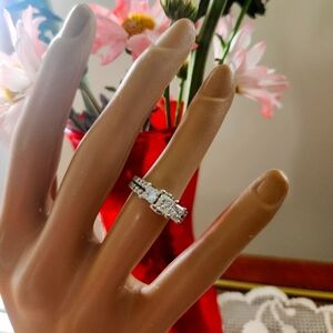 Jared 3 princess cut diamonds with 2 row round diamonds .